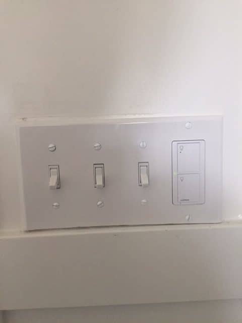 4-Gang electrical switch box with Leviton wall plate